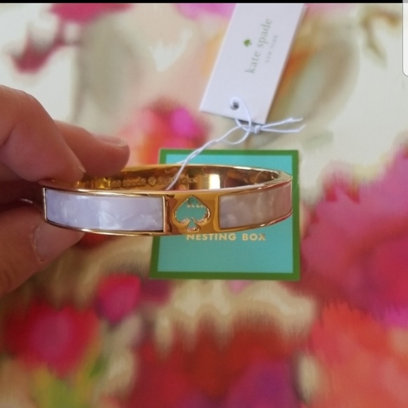 kate spade Jewelry - kate spade cream hole punch spade bracelet